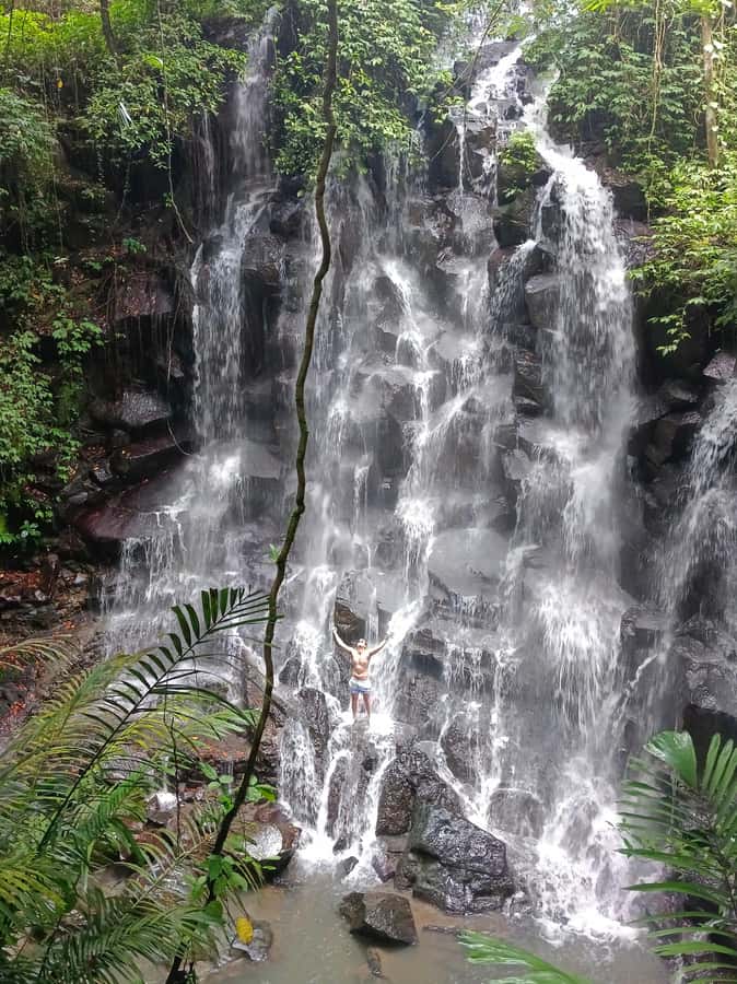 Bali: Best of Ubud Waterfalls Tour - Kanto Lampo Waterfall: the rock formation and the 5 minute stair descent