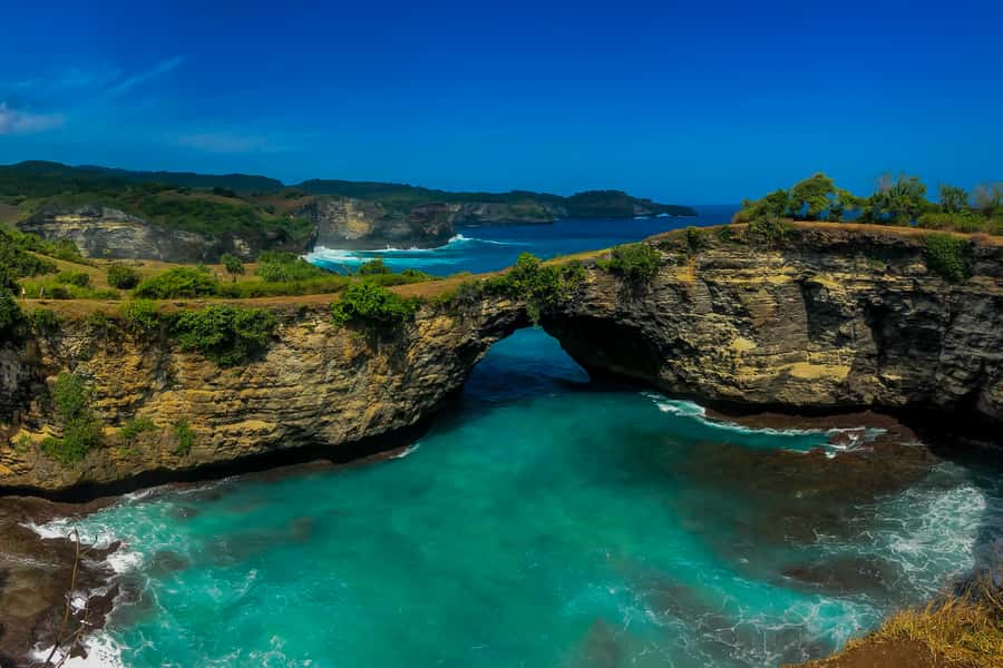 Bali: Early Access to Nusa Penida Day Trip - Broken Beach: the arch, the horseshoe cove, and wave timing