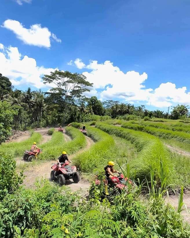 Bali: Guided Quad Bike Ride with Waterfall and Swing Options - Kanto Lampo Waterfall, where you can actually cool down