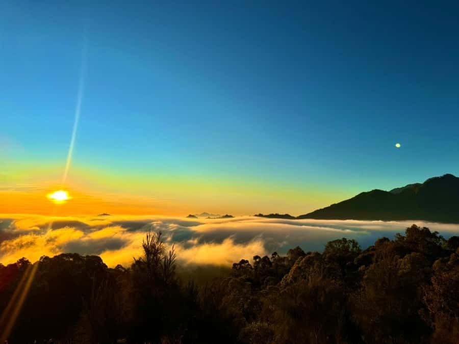 Bali: Private Sunrise Jeep Tour and Black Lava All Include - The early mountain sunrise: warm drinks, breakfast, and Mount Abang views
