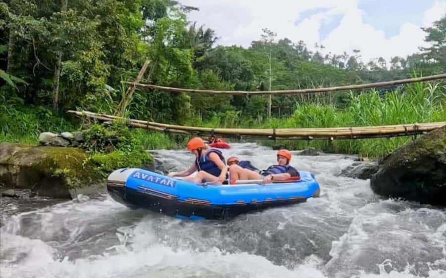 Bali: Telaga Waja White Water Rafting And ATV Quad Adventure - Rafting on the Telaga Waja River, rapids, the dam drop, and waterfall scenery