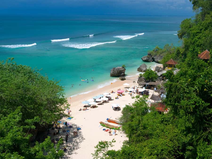 Bali: Uluwatu Temple, Kecak Dance, and Jimbaran Dinner Tour - Padang Padang Beach: Eat Pray Love cliffs, stair descent, and ocean time