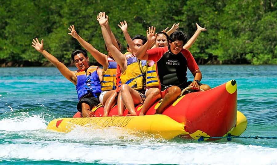 Bali: Water Sports Adventure & Secret Beaches Tour - Parasailing over the coast: short flight, big view