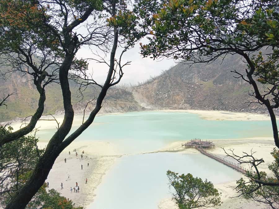 Bandung Kawah Putih Day Tours - Entering Kawah Putih: turquoise crater water and sulfur mist