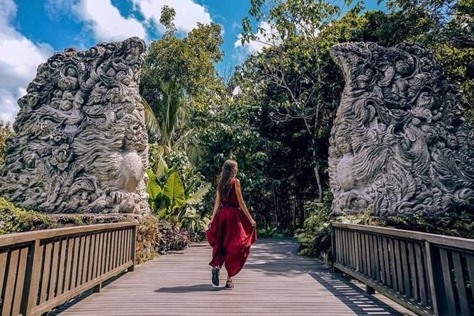 Best of Ubud Private Day Tour with All Inclusive - Stop 1: Tegenungan Waterfall, cool air and a first burst of views