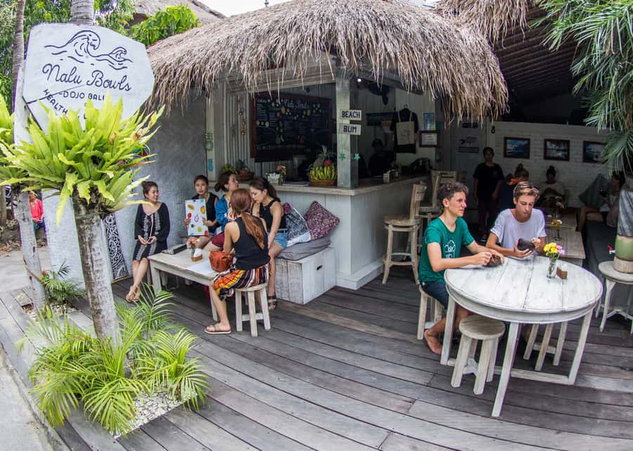 Canggu: Surfing Class, Tanah Lot & Kecak Dance Sunset Tour - Tanah Lot Temple at sunset: how to get the magic without losing your patience