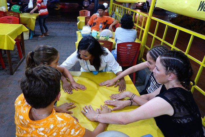 Foodie Tour Bali - Puputan Garden pass-by: watching local night life