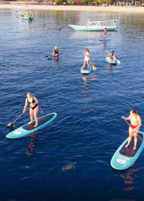 Gili sunrise stand-up paddle boarding (drone photoshoot) - Why This Gili Sunrise SUP Beats Sleeping In