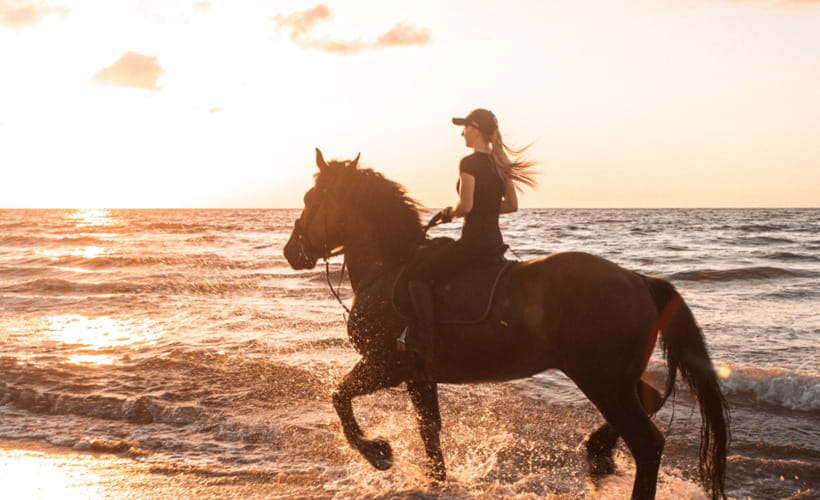 Gili Trawangan: Beach Horseback Riding with Pickup Hotel - Caves, Elephant Carvings, and White Sand Photo Pauses