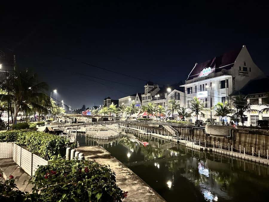 Jakarta: Private Guided Sightseeing & Street Food Night Tour - Mangga Besar street food: Martabak chocolate and cheese, plus street characters