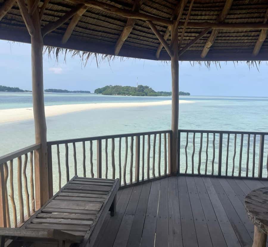 Jakarta: Thousand Island Tour with Canoeing and Snorkeling - Pari Island snorkeling: white sand beach time with a wooden-boat setup