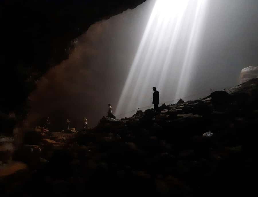 Jomblang Cave & Pindul Cave Including Guide, Lunch & Ticket - Inside Jomblang: muddy steps, optional headlamp, and real footing