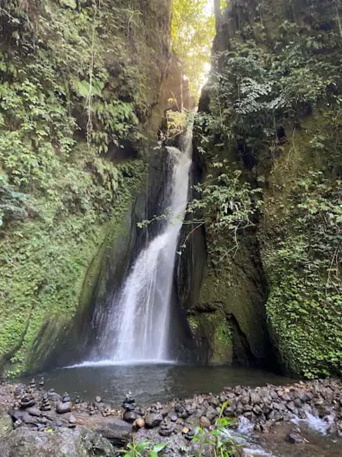 North Bali: Explore Munduk Waterfall Trekking Experience - Red Coral Waterfall: Where the Jungle Mist Shows Up
