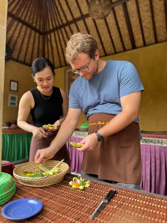 packages cooking class and romantic dinner in a local home - Entering a Balinese house, seeing family life up close