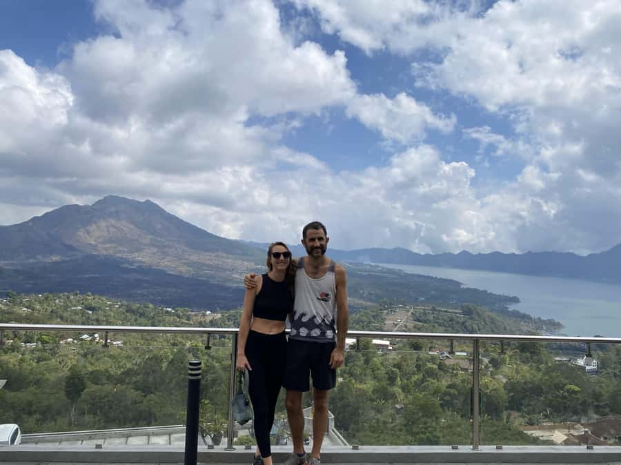 Ubud: Downhill Bike Tour with Rice Fields, Volcano and Meal - The cultural stops: school, family compound, temple, and rice farming