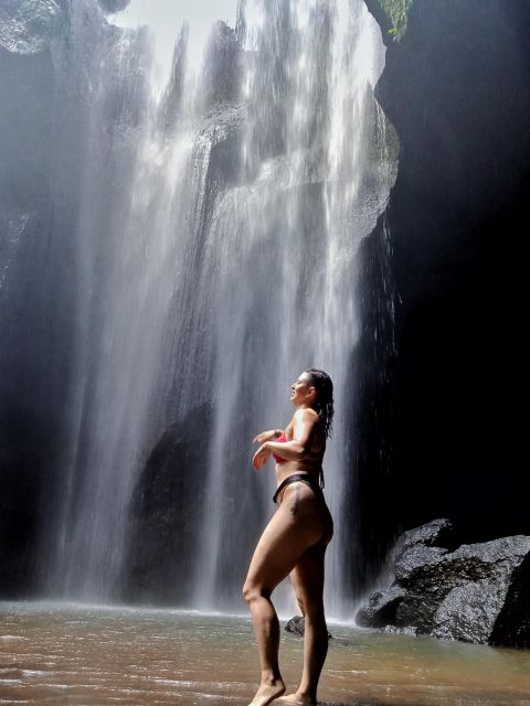 Ubud: Hidden Gems and Waterfalls Private Tour - Kanto Lampo: 50 feet of waterfall and classic steps